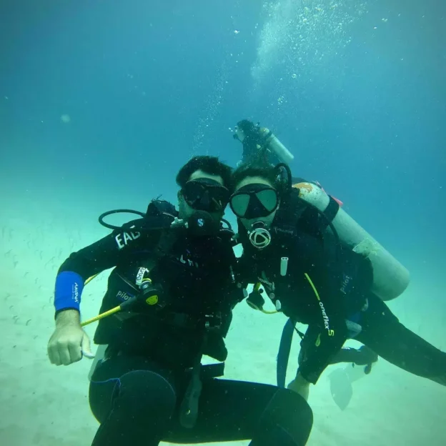 A pair of divers exploring reefs in Daphne, Galapagos
