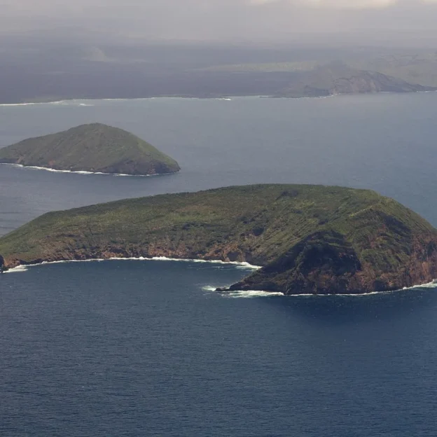 View of Tortuga Island, a semicircular volcanic caldera in the Galapagos.