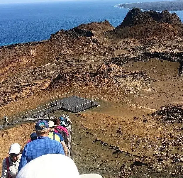 Tourists walking the Bahia Tour trail, Galapagos
